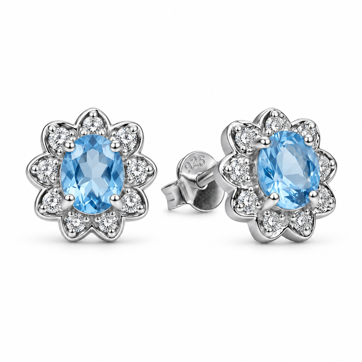 Created Blue Topaz and Cubic Zirconia Floral Stud Earrings in Rhodium-Plated Sterling Silver