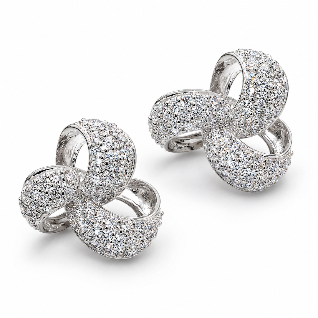 0.85 Inch Pavé Diamond Simulant Three-Loop Knot Stud Earrings in Rhodium-Plated Sterling Silver