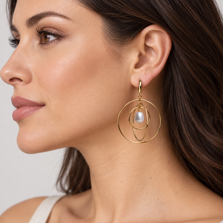 Three-Dimensional Rotating Ring Pearl Drop Earrings – 2 Inch Orbital Dangle Earrings