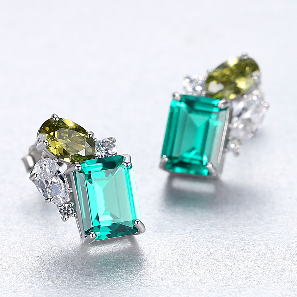 Emerald Simulant Silver Earrings